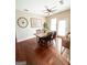 Dining area boasts hardwood floors, natural light, a ceiling fan and a wooden table with chairs at 870 Nw Mayson Turner Nw Rd # 1227, Atlanta, GA 30314