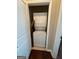 Small laundry closet with a stacked washer and dryer at 870 Nw Mayson Turner Nw Rd # 1227, Atlanta, GA 30314