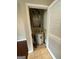 This is a utility closet with a water heater, furnace, and tile floor at 870 Nw Mayson Turner Nw Rd # 1227, Atlanta, GA 30314