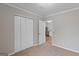 Inviting bedroom with large closet and view to the updated kitchen, ideal for a comfortable living space at 6973 Stephens Dr, Rex, GA 30273