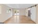 Spacious room with stylish sliding barn doors, textured ceiling, and access to back yard at 6973 Stephens Dr, Rex, GA 30273