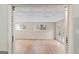 Spacious room with stylish textured ceiling, windows and access to back yard at 6973 Stephens Dr, Rex, GA 30273