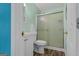 The bathroom features a toilet, sink, and glass-door shower at 62 Honey Ln, Mcdonough, GA 30252