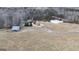 Spacious land surrounding a house, shed and a pond at 1187 Attaway Road, Roopville, GA 30170