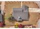 Aerial view showcases the roof and landscaping of the home in a suburban neighborhood at 135 Oakpark Ter, Mcdonough, GA 30253