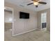 Carpeted bedroom with an adjoining bathroom and upper landing at 135 Oakpark Ter, Mcdonough, GA 30253