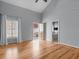 Bedroom featuring hardwood flooring, neutral paint, and a door to the bathroom at 135 Oakpark Ter, Mcdonough, GA 30253