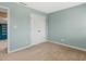 Bedroom featuring a closet and doorway to an adjacent room at 135 Oakpark Ter, Mcdonough, GA 30253