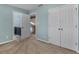 Bedroom featuring a closet and doorway to an adjacent bathroom and landing at 135 Oakpark Ter, Mcdonough, GA 30253