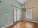 Elegant dining room with stylish chandelier and hardwood floors at 135 Oakpark Ter, Mcdonough, GA 30253