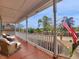 Inviting front porch with comfortable seating and American flag decor at 135 Oakpark Ter, Mcdonough, GA 30253