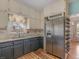 Modern kitchen featuring stainless steel appliances and custom cabinetry at 135 Oakpark Ter, Mcdonough, GA 30253