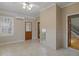 Sunroom featuring tile flooring, neutral paint, and lots of natural light at 135 Oakpark Ter, Mcdonough, GA 30253