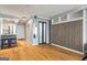 Well-lit living space with hardwood floors, stainless appliances, and a hidden Murphy bed at 2870 Pharr Nw Ct # 2008, Atlanta, GA 30305