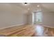 Bright, airy bedroom featuring hardwood floors, recessed lighting and a window with a view at 2015 Fontainbleau Dr, Conyers, GA 30094