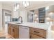 Kitchen with large island, stainless steel appliances, modern backsplash, and hardwood floors at 2015 Fontainbleau Dr, Conyers, GA 30094