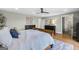 Spacious main bedroom featuring hardwood floors, a ceiling fan, and neutral paint at 757 Fischer Rd, Sharpsburg, GA 30277