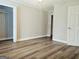 Bedroom with hardwood floors and closet at 3930 W Side Pl, Ellenwood, GA 30294