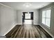 Spacious living room featuring hardwood floors at 3930 W Side Pl, Ellenwood, GA 30294