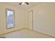 Empty bedroom featuring a window with natural light and a neutral paint, providing a blank canvas at 101 Nightwind Ct, Peachtree City, GA 30269