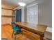 Dining room with a large wood table and window with lots of natural light at 308 Tulipwood Sw Cir, Conyers, GA 30094