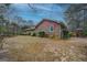 Brick exterior, red shutters, nice lawn, and a play set, perfect for Gathering enjoyment at 308 Tulipwood Sw Cir, Conyers, GA 30094