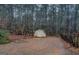 An exterior shot of the shed shows that it has an expansive yard at 308 Tulipwood Sw Cir, Conyers, GA 30094