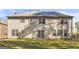 Spacious backyard features a grassy area, patio, and ample sunlight at 100 Windmeadow Way, Fayetteville, GA 30214