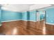 Expansive bonus room with hardwood floors and recessed lighting at 100 Windmeadow Way, Fayetteville, GA 30214