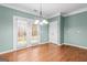Bright breakfast nook with french doors leading to the backyard at 100 Windmeadow Way, Fayetteville, GA 30214