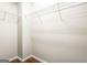 This walk-in closet features white wire shelving and hardwood floors at 100 Windmeadow Way, Fayetteville, GA 30214