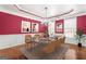Formal dining room features a chandelier, seating for six, and contemporary wall art at 100 Windmeadow Way, Fayetteville, GA 30214