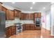 Gourmet kitchen with stainless steel appliances, granite countertops, and tile backsplash at 100 Windmeadow Way, Fayetteville, GA 30214