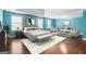 Spacious main bedroom featuring a sitting area and a large bed at 100 Windmeadow Way, Fayetteville, GA 30214