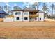 Exterior elevation of house featuring a walkout basement and back porch at 130 Windchime Way # 9, Tyrone, GA 30290