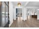 Open-concept living area with sleek floors, showcasing modern design and abundant natural light at 130 Windchime Way # 9, Tyrone, GA 30290