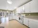 Bright eat-in kitchen with ample cabinet space and views to the backyard at 9135 Woodhaven Way, Mcdonough, GA 30253