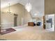 Open-concept living space with plenty of natural light and high vaulted ceiling at 9135 Woodhaven Way, Mcdonough, GA 30253