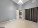 Bright primary bedroom featuring neutral paint and carpet and bathroom access at 9135 Woodhaven Way, Mcdonough, GA 30253