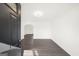 Inviting entryway with dark hardwood floors, fresh paint, and an open archway at 2692 Fairview Rd, Covington, GA 30016