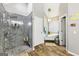 Beautiful bathroom featuring a glass-enclosed shower and separate soaking tub at 230 Wyngate Cir, Fayetteville, GA 30215
