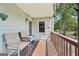 Inviting outdoor deck with seating, ideal for relaxation and enjoying the surrounding scenery at 230 Wyngate Cir, Fayetteville, GA 30215