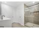 Bathroom featuring double doors and a glass-enclosed tiled shower at 3973 Laurel Bend Dr, Snellville, GA 30039