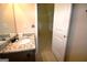 Bathroom features granite countertop, tile flooring, and view into the next room at 175 Osier Dr, Mcdonough, GA 30252