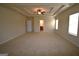 Spacious bedroom with carpet floors and a ceiling fan at 175 Osier Dr, Mcdonough, GA 30252