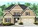 Charming two-story home with a two-car garage and a well-manicured lawn at 175 Osier Dr, Mcdonough, GA 30252