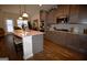 Stylish kitchen with granite countertops, stainless appliances, and breakfast bar at 175 Osier Dr, Mcdonough, GA 30252