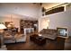 Open-concept living area featuring hardwood floors, a loft, and a combined living and dining space with modern kitchen at 175 Osier Dr, Mcdonough, GA 30252