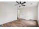 Spacious bedroom with hardwood floors and closet storage at 115 Stewart Hollow Ln, Covington, GA 30016