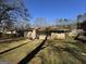 Backyard featuring a nice yard and a patio with chairs at 1988 Bencal Se Dr, Atlanta, GA 30316